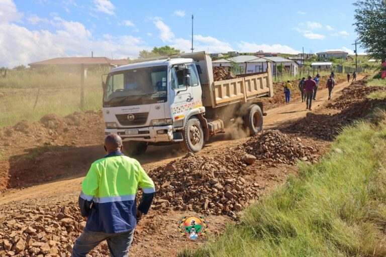TIPPER TRUCK ON THE ROAD